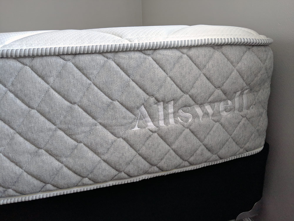 Allswell Luxe Hybrid Mattress side with logo
