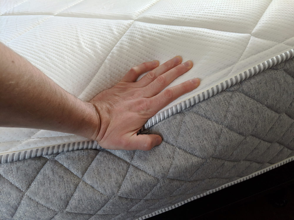 Pressing into the Allswell Luxe Mattress